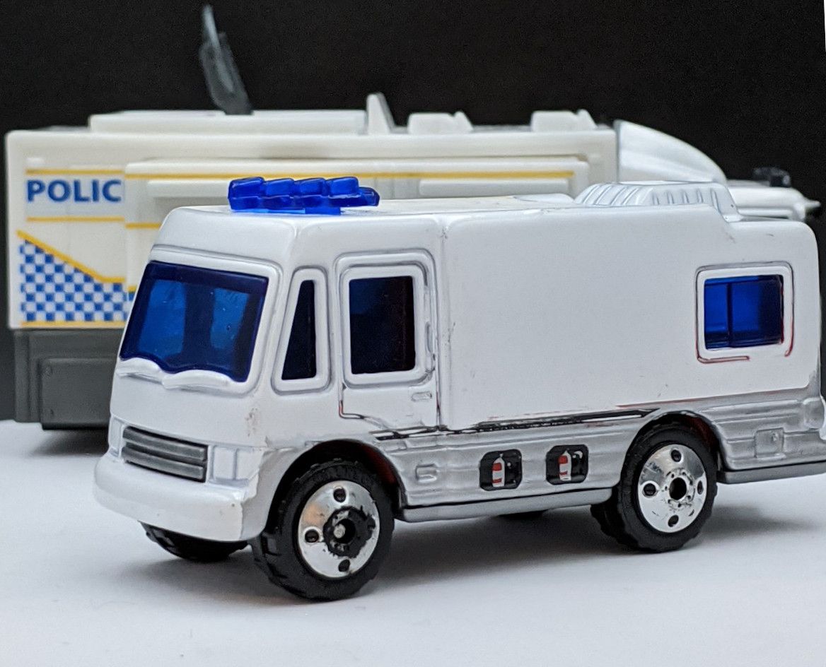 MBX Camper Van with Blue Lights